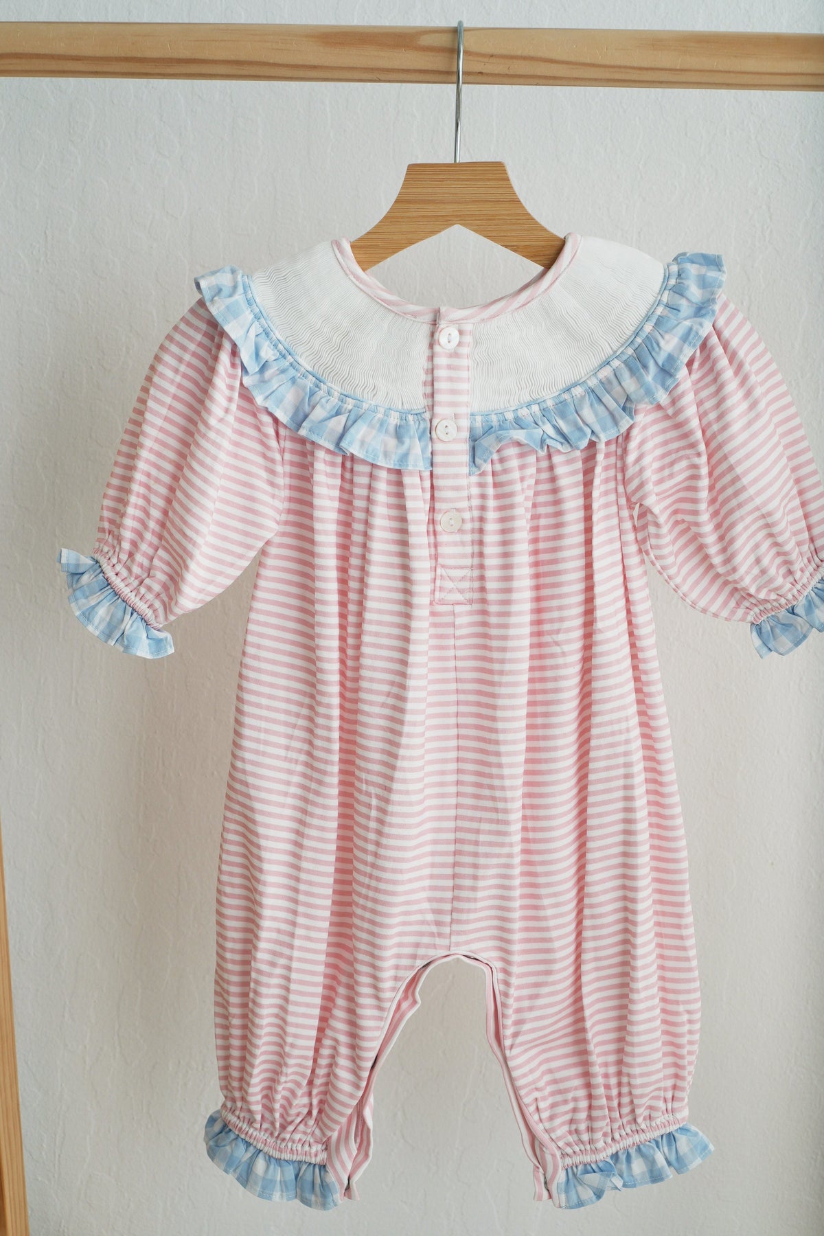 Pink Candy Cane Bow Hand Smocked Ruffle Romper