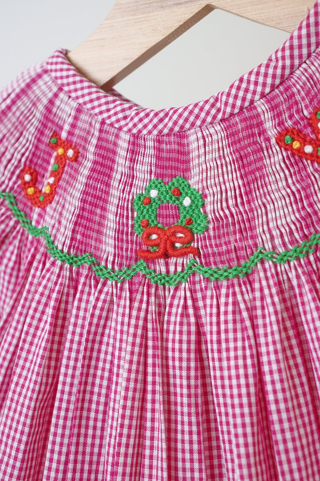 Christmas Pink “Joy” Hand Smocked Gingham Romper for Girls