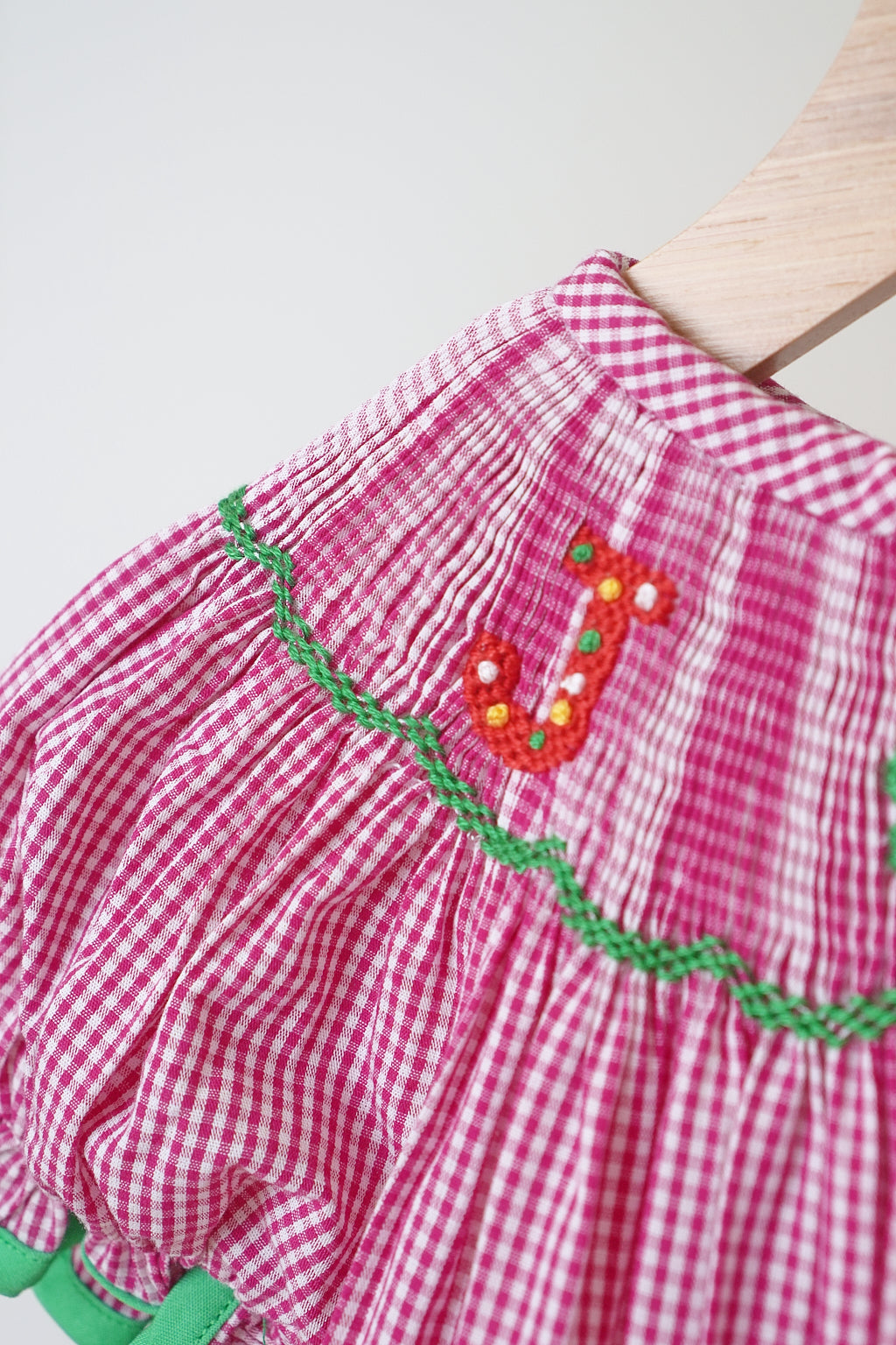 Christmas Pink “Joy” Hand Smocked Gingham Romper for Girls