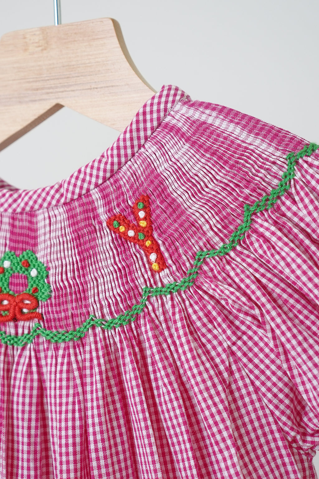 Christmas Pink “Joy” Hand Smocked Gingham Romper for Girls